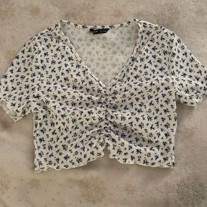 Shein cinched blue flower top. Size: 7-8